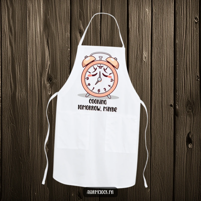 Funny apron showing a tired character reluctantly hitting snooze on an alarm clock, perfect for kitchen duty.