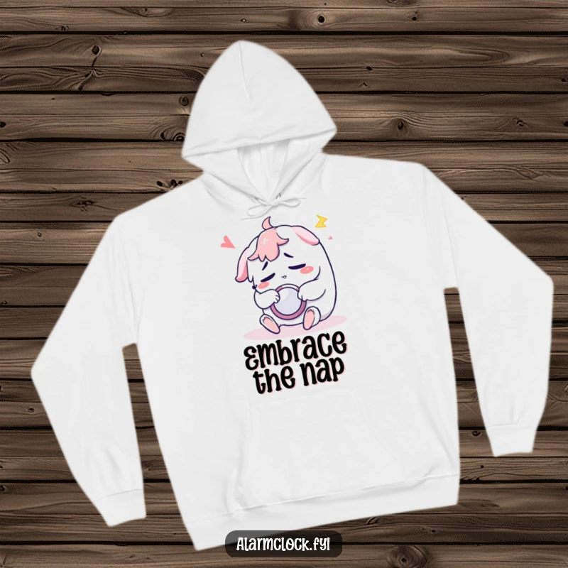 Funny hoodie depicting a sleepy character repeatedly hitting the snooze button, a symbol of morning exhaustion.